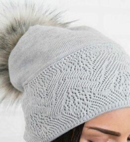 Gray hat with a pompom